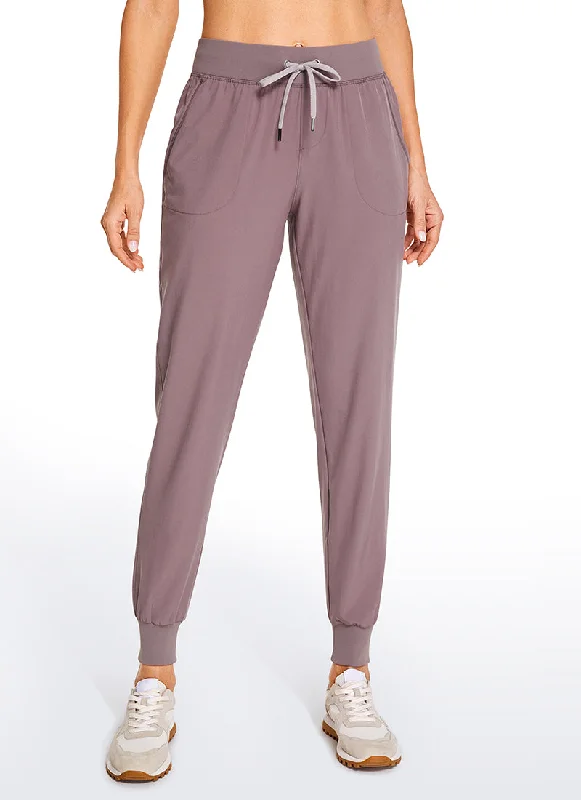 Women's Terry - Cloth Sweatpants in Beige for a Soft and Absorbent Lounge OptionFeathery-Fit Drawstring Jogger with Pockets 28'' - Flat Waistband Women's Terry - Cloth Sweatpants in Beige for a Soft and Absorbent Lounge OptionFeathery-Fit Drawstring Jogger with Pockets 28'' - Flat Waistband