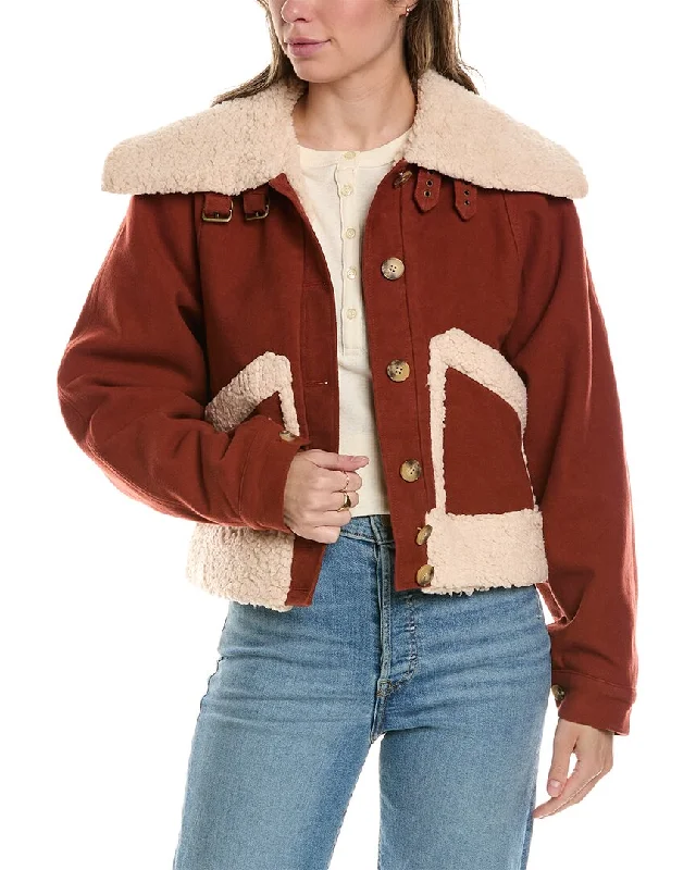 Women's faux fur coats in bright colors for a bold fashion statementTHE GREAT The Peak Coat Women's faux fur coats in bright colors for a bold fashion statementTHE GREAT The Peak Coat