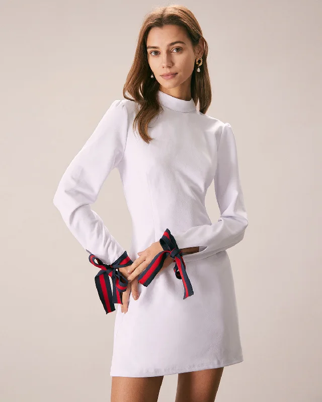 Wrap - Style Women Dress with Adjustable Fit for All Body TypesThe White Mock Neck Bowknot Cuff Mini Dress Wrap - Style Women Dress with Adjustable Fit for All Body TypesThe White Mock Neck Bowknot Cuff Mini Dress
