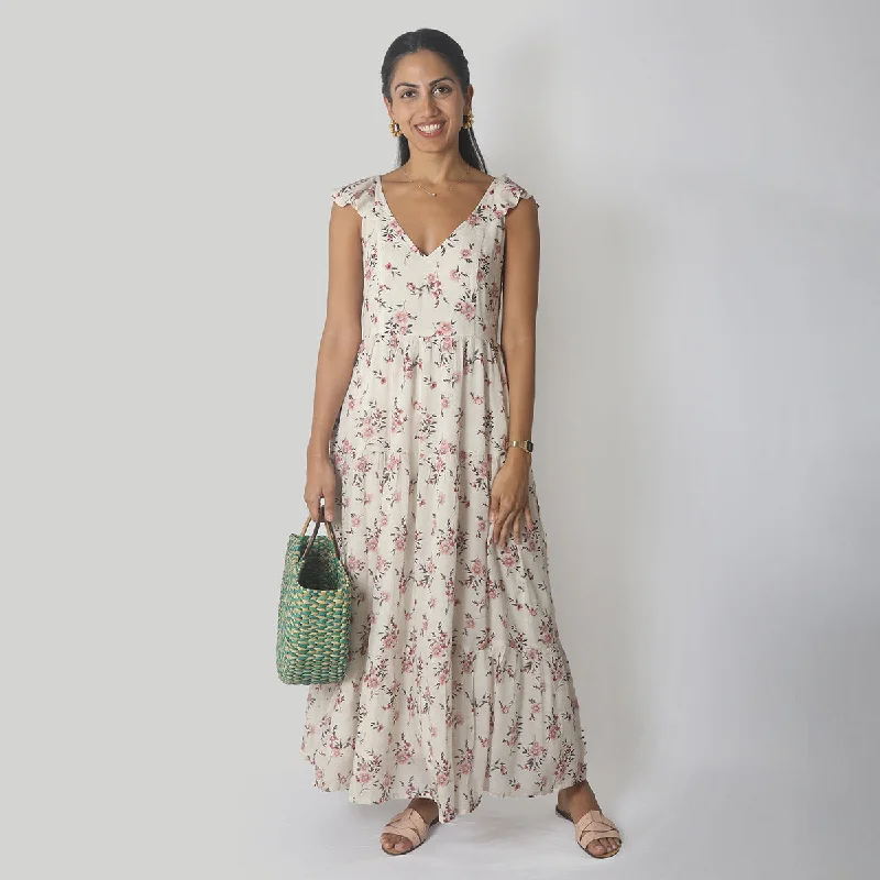 Sleeveless Women Dress in Bright Colors for Summer Parties Sleeveless Women Dress in Bright Colors for Summer Parties Bemberg Crepe Ruffled Maxi Dress | Pink & White Sleeveless Women Dress in Bright Colors for Summer Parties Sleeveless Women Dress in Bright Colors for Summer Parties Bemberg Crepe Ruffled Maxi Dress | Pink & White