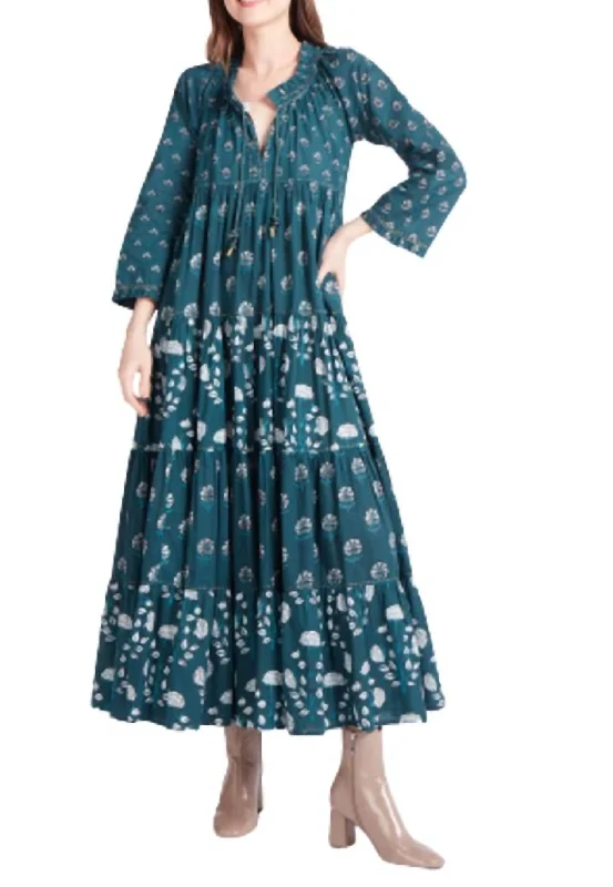 Printed Abstract Women Dress for a Modern and Artistic Appeal Printed Abstract Women Dress for a Modern and Artistic Appeal Sonia Long Dress in Green Indira